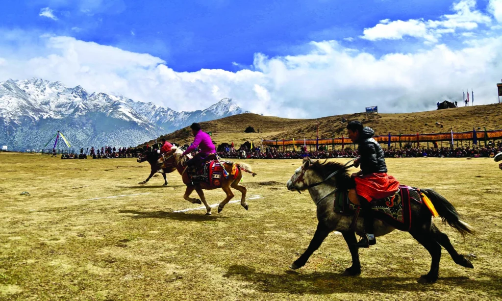 Horse riders at a festival in Gasa