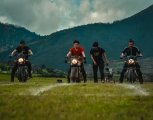 Motorcycle riders on a mountain road in Bhutan
