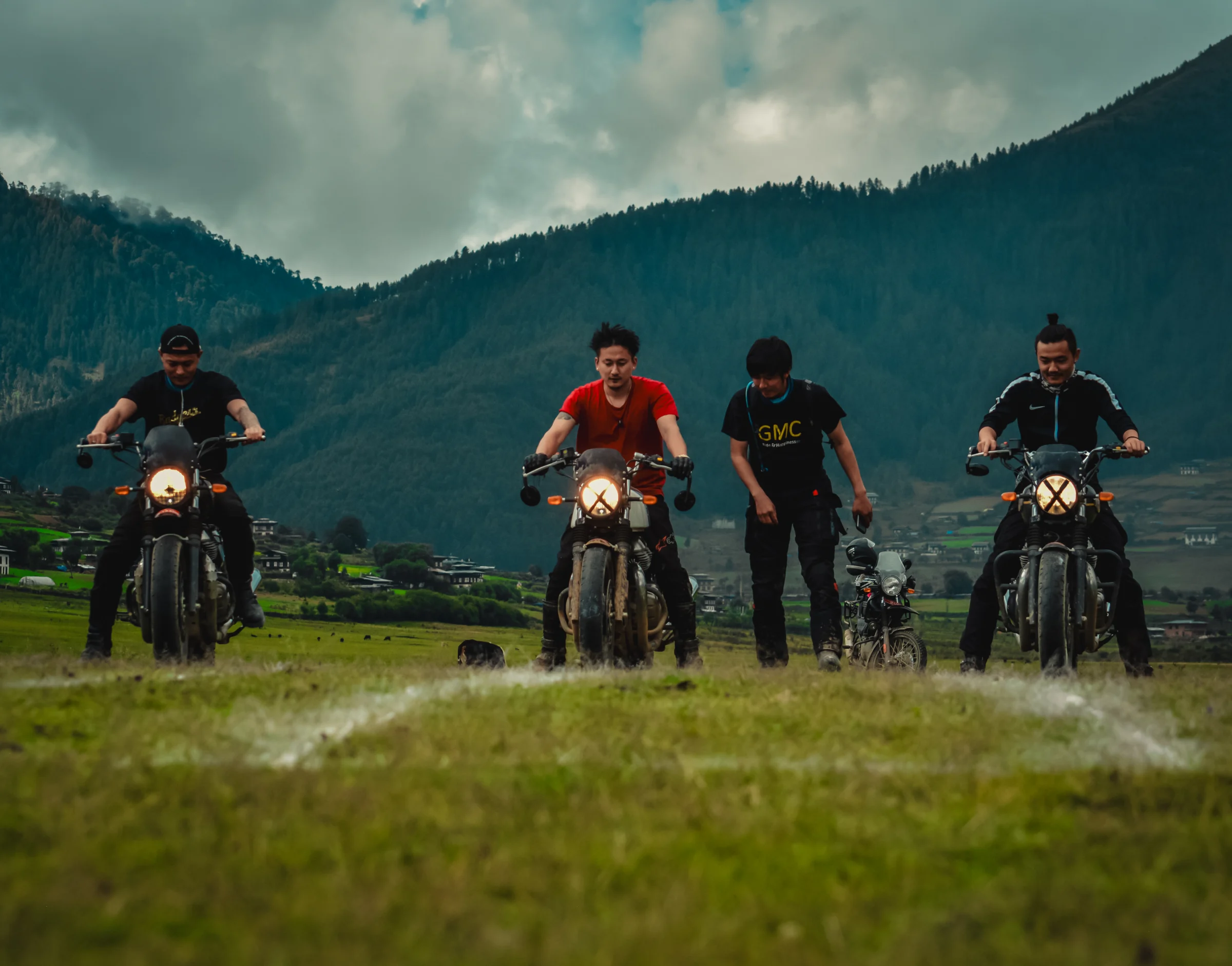 Motorcycle riders on a mountain road in Bhutan