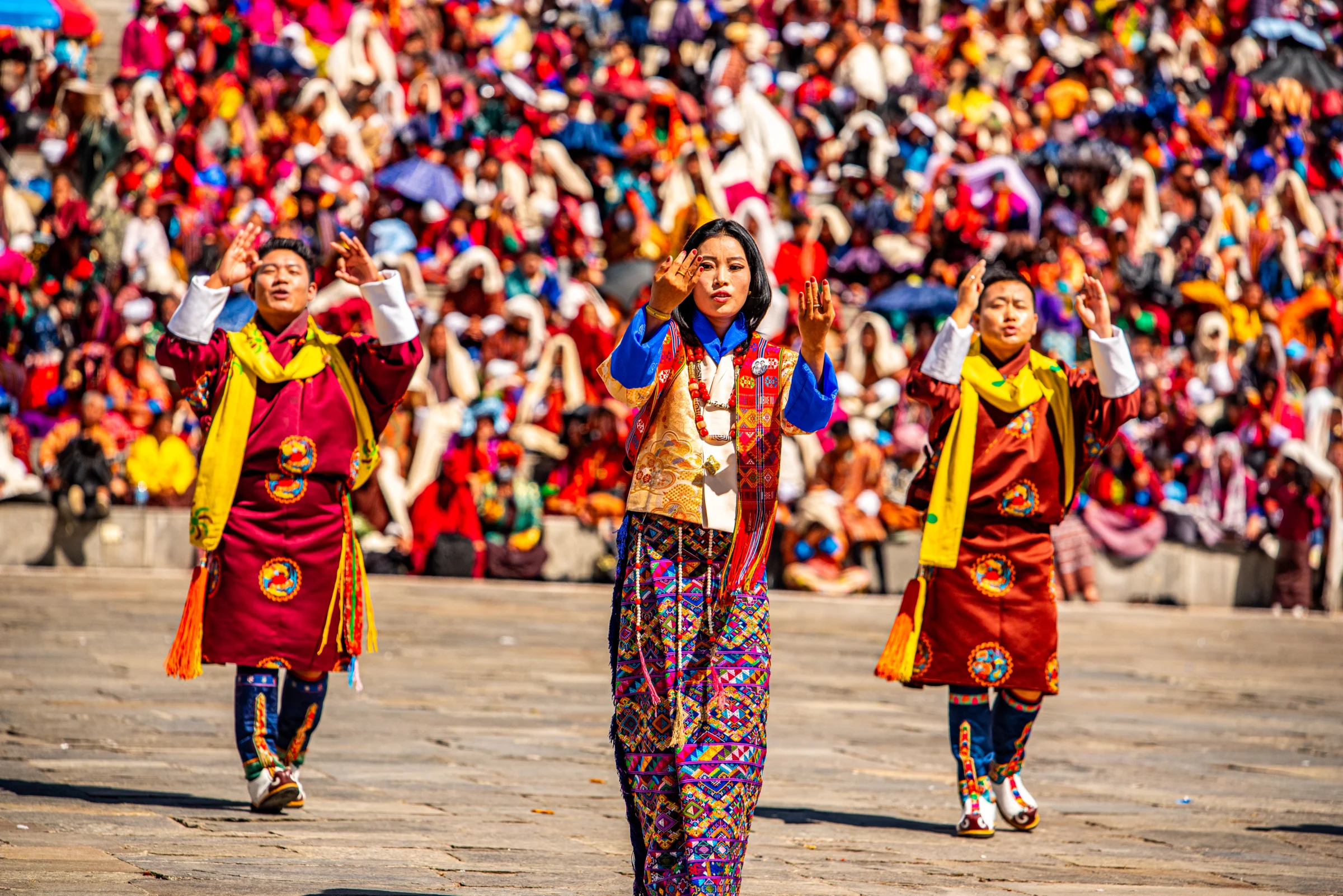 Masked dancers performing at Thimphu Tshechu