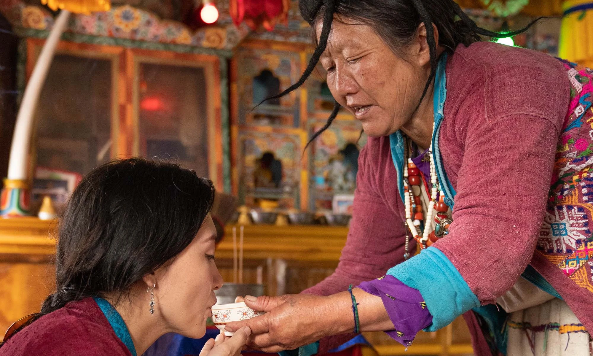 A traditional welcome with ara in Sakteng